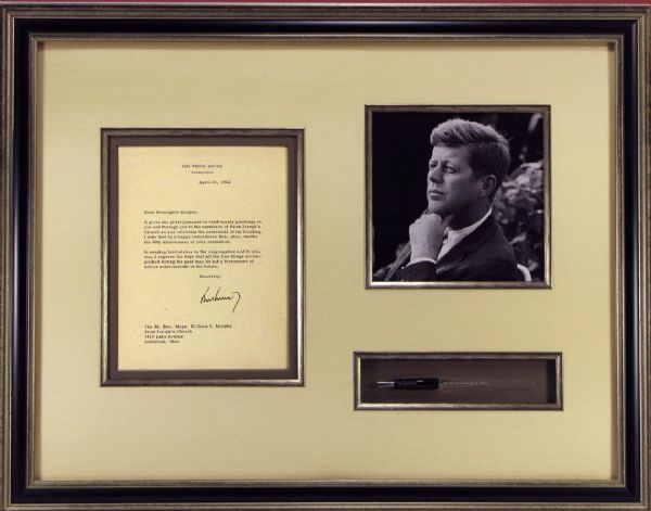 Kennedy Presents the Peace Corp Bill Signer Pen to Hubert H. Humphrey