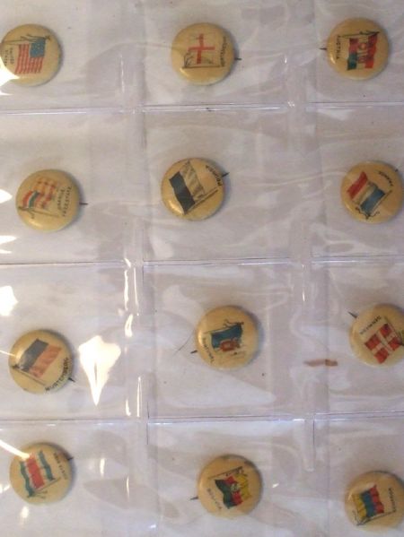Collection of 58 Pinback Buttons Featuring International Flags
