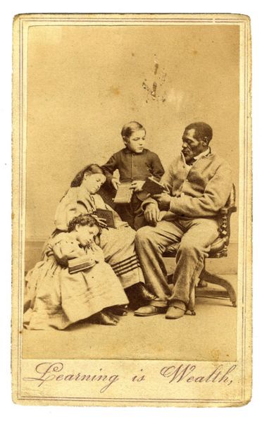 Wilson Chinn - of the Branded Slave Fame - is Photographed with the ‘Light Skin’ Slave Children of New Orleans