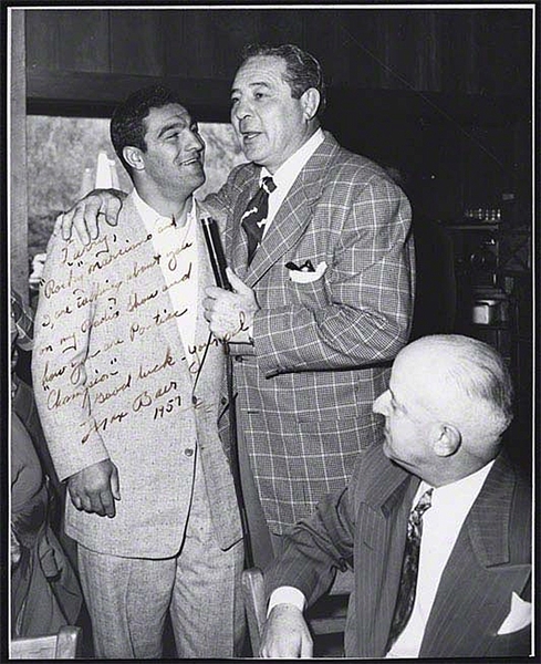 Vintage photograph of Max Baer and Rocky Marciano, Inscribed by Baer.